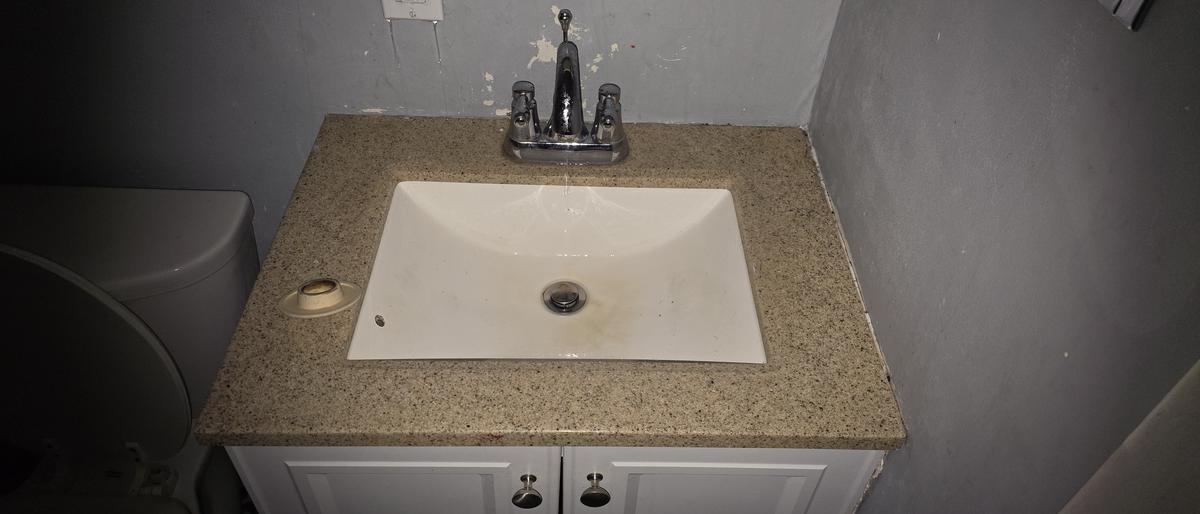 Central Kentucky cleaning - after photo of Bathroom vanity reset by E&K Total Pro
