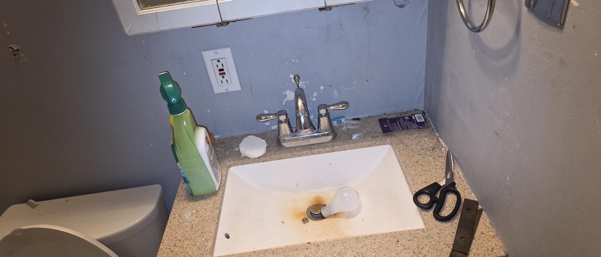 Central Kentucky cleaning - before photo of Bathroom vanity reset by E&K Total Pro